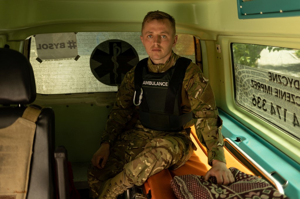 A Ukrainian paramedic waits inside an ambulance at the hospital in the Donetsk region