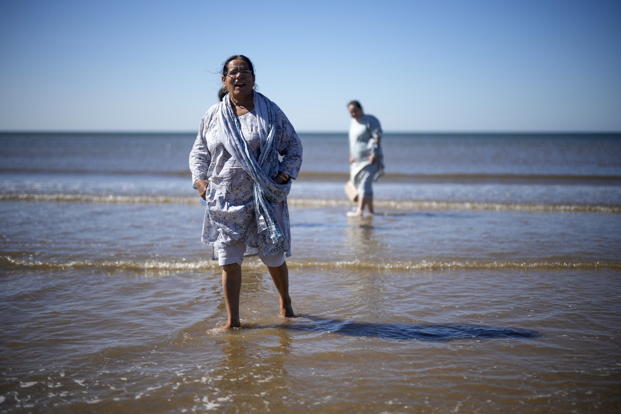 People enjoy paddling in the sea in high temperatures on Blackpool beach 