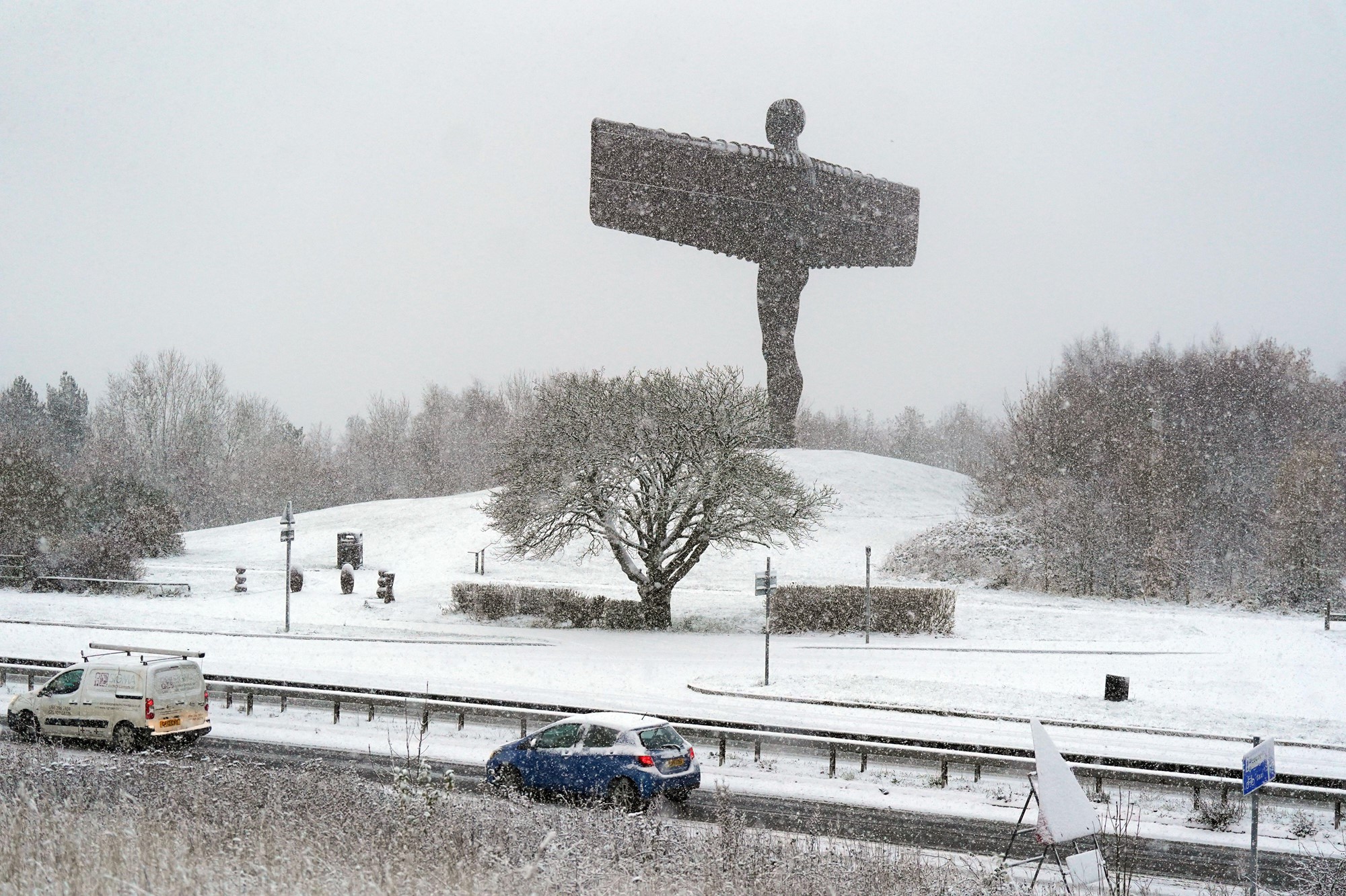 The Angel of the North statue in Gateshead covered in snow. A yellow weather warning for snow and ice will remain in place on Friday for the eastern coast of the the UK